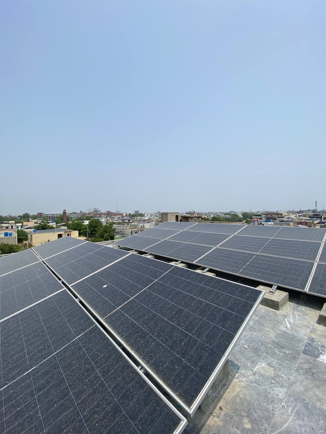 Rooftop solar array providing backup power at a girls hostel in Lahore